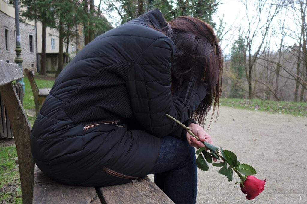 sad girl, red rose, lonely-3007323.jpg